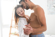 © LIGHTFIELD STUDIOS - beautiful young couple dancing at home in morning