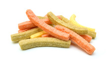 Naturally Baked Veggie Straws Made From Tomatoes, Spinach And Potatoes On White Background