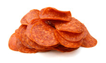 Lices Of Pepperoni On White Background