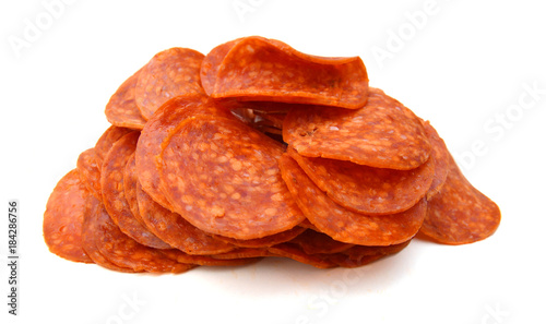 lices of pepperoni on white background Fotobehang