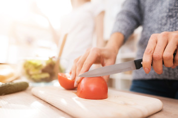 Sticker - Mom and daughter are cooking together in the kitchen.