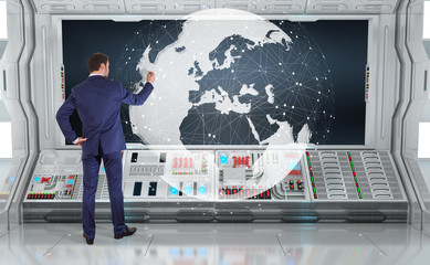 Poster - Businessman using digital planet earth interface on a board 3D rendering