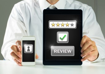 Poster - Man holding tablet and phone with review star ratings