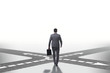 © Elnur - Young businessman at crossroads in uncertainty concept
