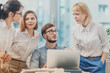 © Suteren Studio - Business team at the office