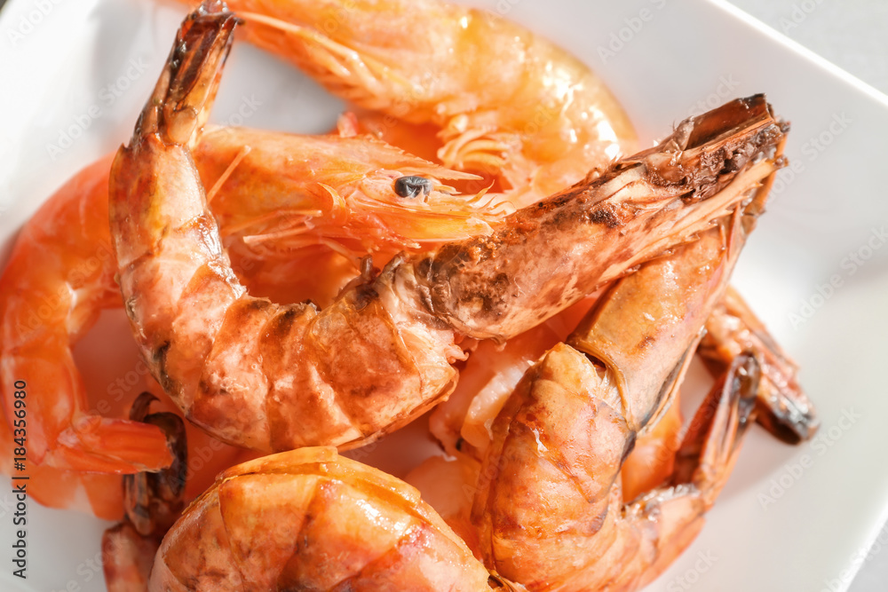 Delicious shrimps on plate, closeup