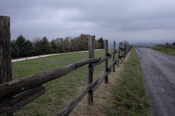 Wall Mural - wooden fence along the road