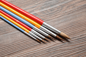 A group of paint brushes