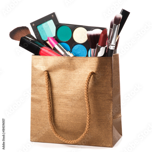 Different makeup objects in shopping bag Canvas-taulu