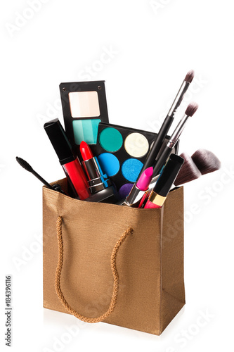 Valokuvatapetti Different makeup objects in shopping bag