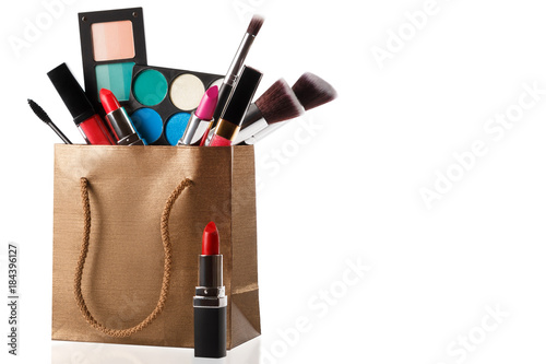 Different makeup objects in shopping bag Canvas-taulu