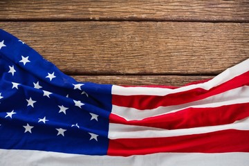 Wall Mural - American flag on a wooden table