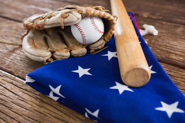 Wall Mural - Baseball bat and gloves on an American flag