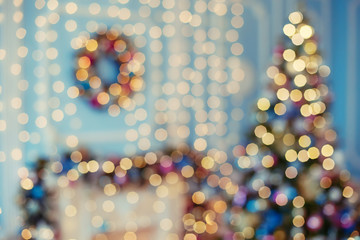 Wall Mural - Blurred garland light bokeh. Christmas blur pattern, defocused background