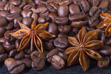 Fototapeta Boho - star anise, on the background of coffee with beautiful highlights on the surface of grains