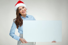 Smiling Santa Girl Holding White Blank Sign Board.