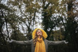 © santypan - Beautiful woman having a good time in the woods. Nature concept.