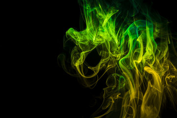 Colored smoke on black background