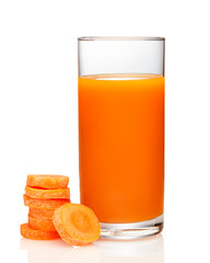 Wall Mural - Glass of carrot juice and fresh carrots isolated on white