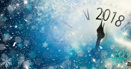 2018 New Year background with clock and snowflakes