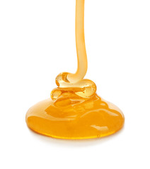 Poster - Sweet honey pouring on white background