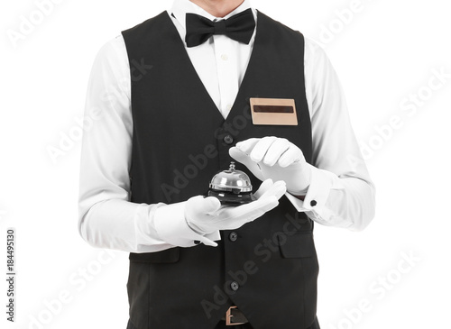 Fotomural Handsome bellboy on white background, closeup