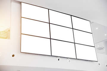 wall LCD display screen panel in modern office building with clipping path at blank screen