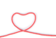 Heart Shaped Knot On A Red White Rope String Isolated On White Background