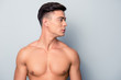 © deagreez - Profile side view half-faced photo of handsome sexy athletic confident focused young sporty guy with flawless ideal skin, isolated on grey background, copyspace