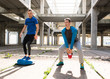 Young handsome athlete men doing exercise  in an old abandoned building outdoor