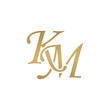 Initial letter KM, overlapping elegant monogram logo, luxury golden color