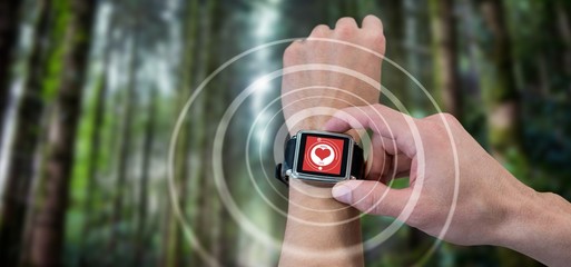 Poster - Composite image of cropped image of man using watch