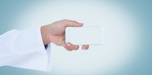 Poster - male doctor holding smart phone with blank screen