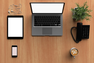 Top view mock up of computer screen or laptop, tablet, smartphone and earphone on wooden table in the office.