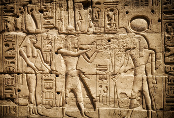 Art of ancient Egypt. Bas-relief on the wall of the ancient temple of Karnak in Luxor