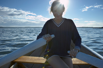 Young woman in rowing boat