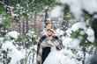 © stakhov - Couple in love are hugging under the plaid on background of the snowy trees. Winter wedding.