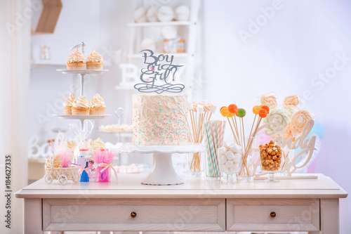 Boy Or Girl Cake And Different Treats For Baby Shower Party On