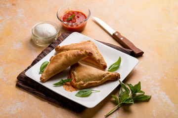 Sticker - panzerotti with tomato and mozzarella