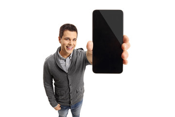 Wall Mural - Young guy showing a phone