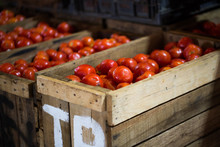 Red Tomatoes In A Wooden Box In The Indian Market In Mauritius