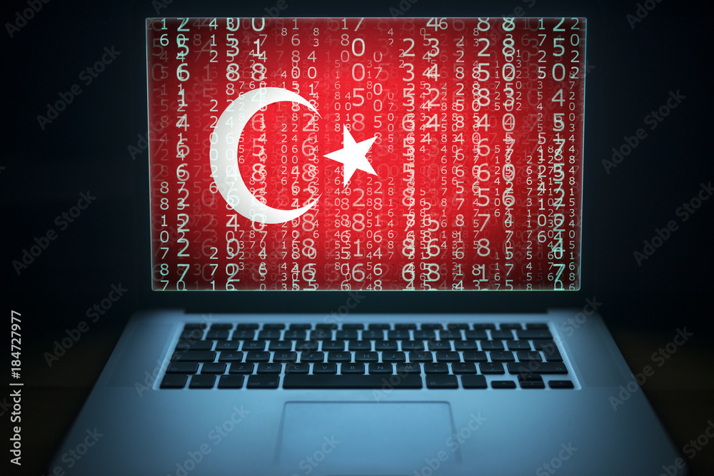 Turkish hacker. Laptop with binary computer code and Turkey flag on the ...