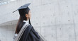 © leungchopan - Graduation woman looking at the top