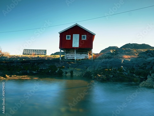 Photo  Traditional red and white houses in small fishing village