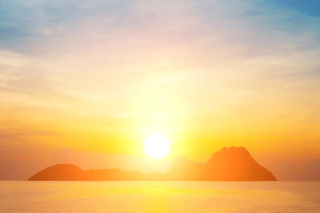 Wall Mural - Bright colors at dawn on the beach at sunrise in the Gulf of Thailand.