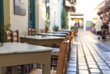Athens, Greece. Greek Tavern Tables And Chairs In A Row