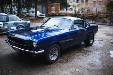 Clean old blue car on open air