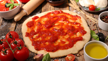 Poster - cooking pizza on wood background