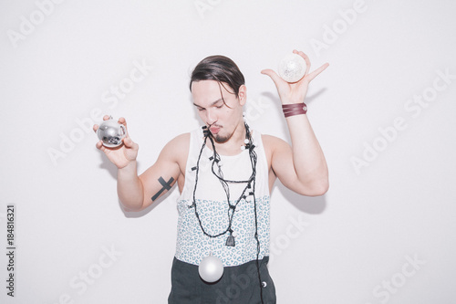 Fotografie, Obraz a man with christmas lights on white background