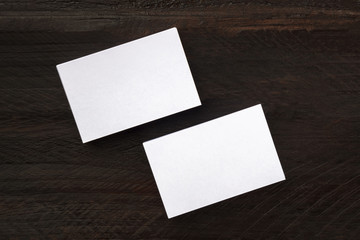 Wall Mural - Overhead photo mockup of two white business cards